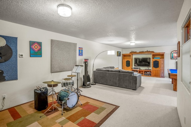 living room featuring carpet, a textured ceiling, and billiards