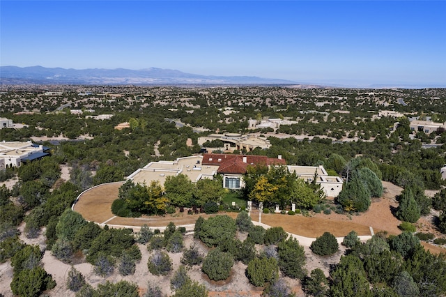 drone / aerial view featuring a mountain view