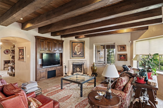 living room with beam ceiling and wooden ceiling