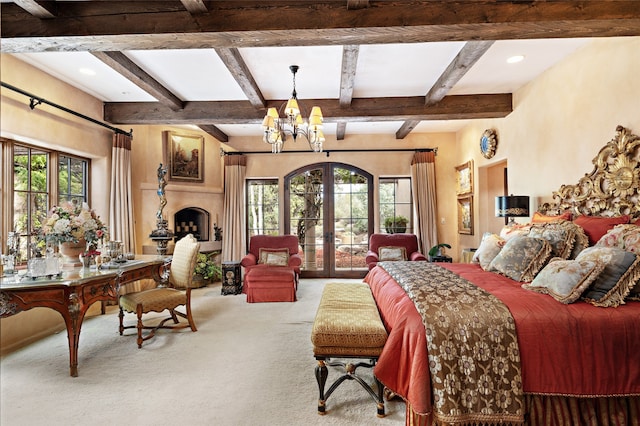 carpeted bedroom featuring beam ceiling, multiple windows, french doors, and a chandelier