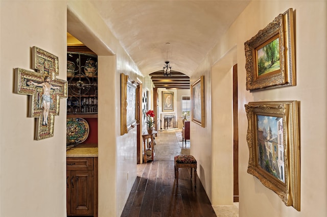 hall with hardwood / wood-style flooring