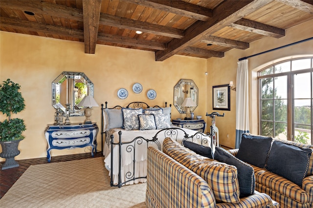 bedroom featuring beam ceiling and wooden ceiling