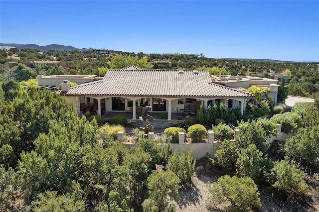 rear view of house with a patio area