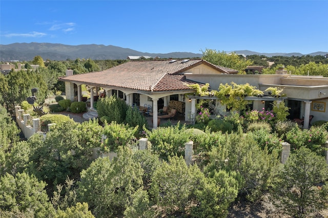 exterior space featuring a mountain view