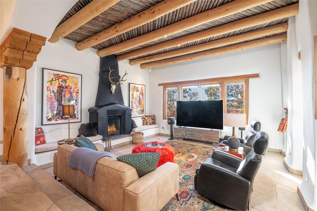 living room with beam ceiling and wood ceiling