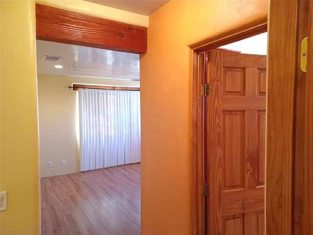 corridor featuring light hardwood / wood-style flooring