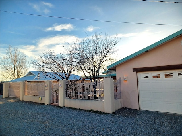 exterior space with a gate and fence