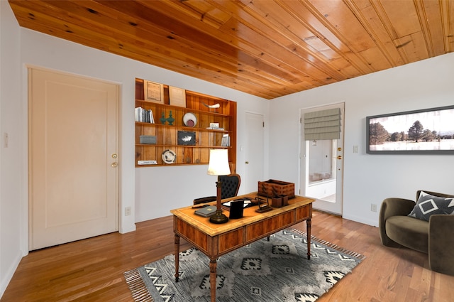 office with hardwood / wood-style flooring and wooden ceiling