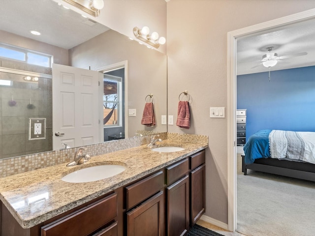 bathroom featuring vanity and ceiling fan