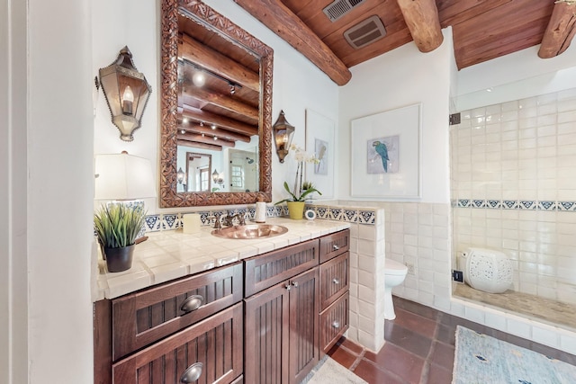 605 Abeyta St, Santa Fe, NM 87505 - bathroom with wood ceiling, vanity, beam ceiling, tile patterned flooring, and toilet