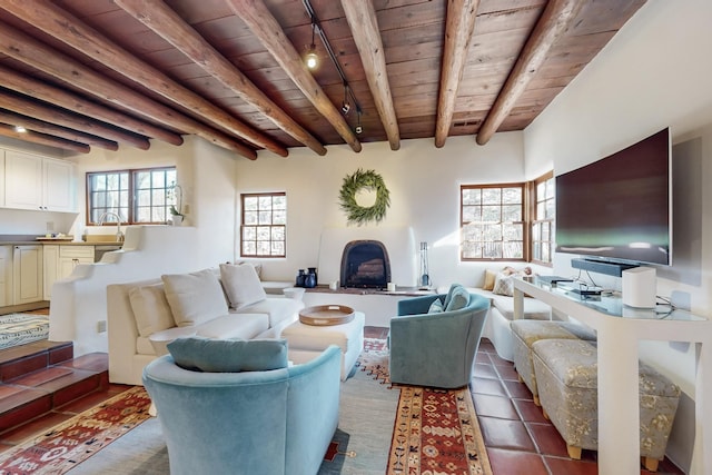 605 Abeyta St, Santa Fe, NM 87505 - living room with tile patterned floors, beam ceiling, wood ceiling, and sink