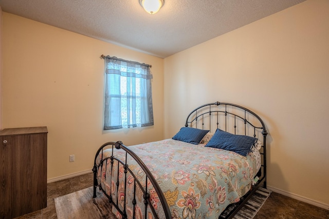 bedroom with a textured ceiling