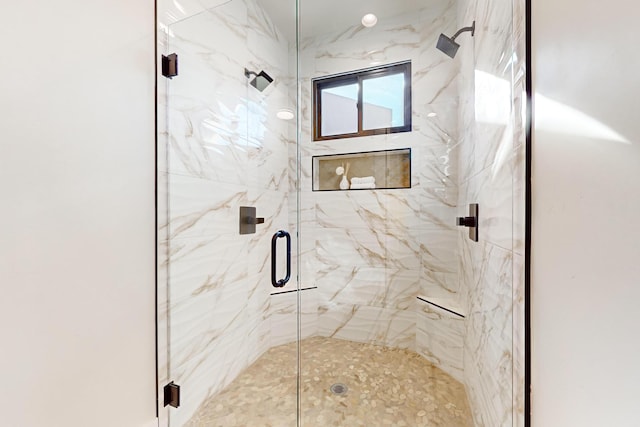 bathroom with an enclosed shower