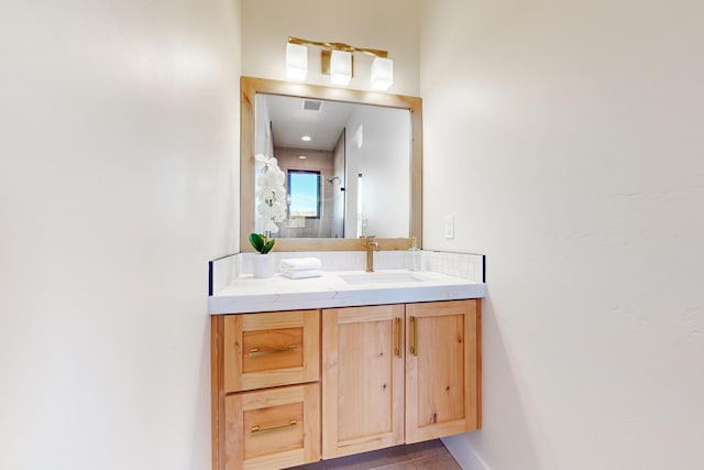 bathroom featuring tile patterned floors and vanity