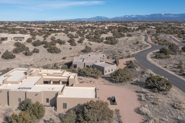 drone / aerial view featuring a mountain view