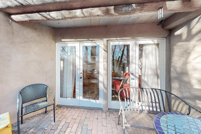 doorway to property featuring french doors