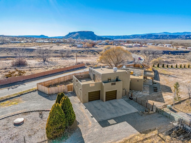 drone / aerial view featuring a mountain view