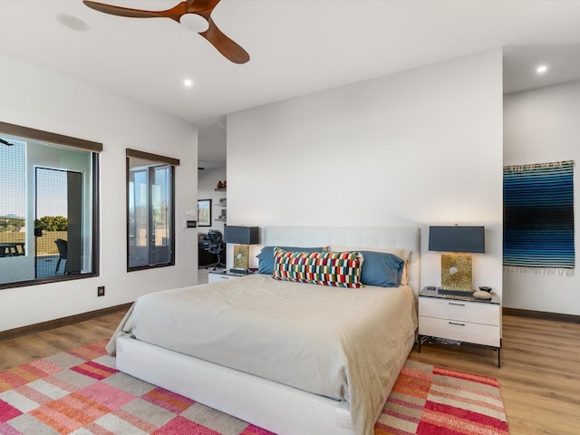 bedroom featuring ceiling fan and hardwood / wood-style floors