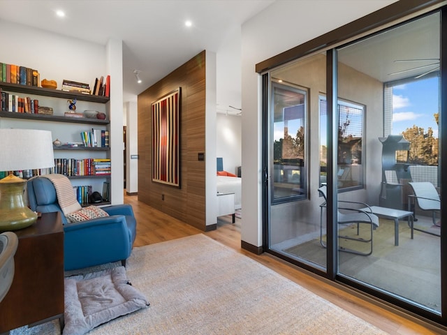 living area with light hardwood / wood-style flooring