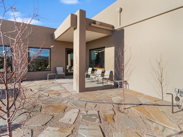 rear view of house with a patio area