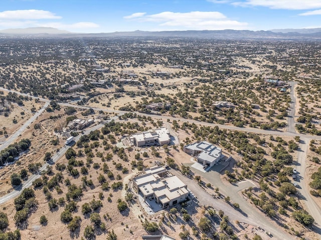 drone / aerial view featuring a mountain view