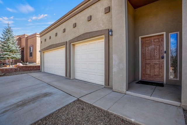 garage featuring driveway