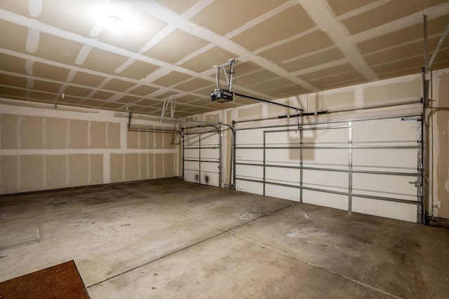 garage featuring a garage door opener