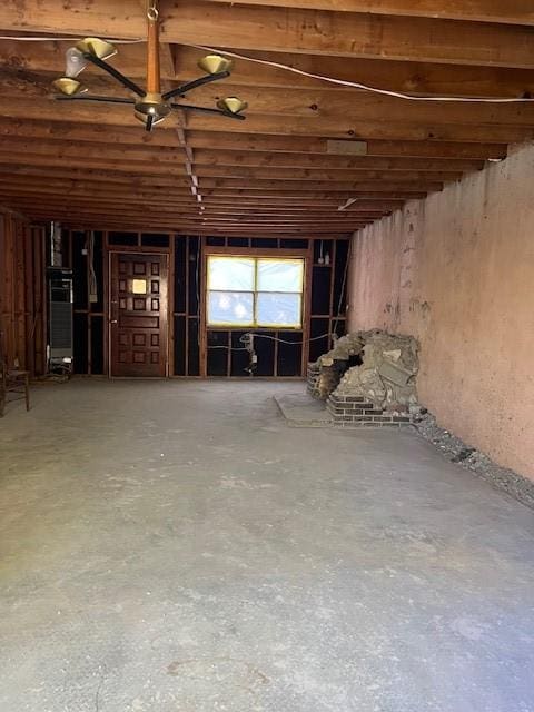 misc room with concrete flooring