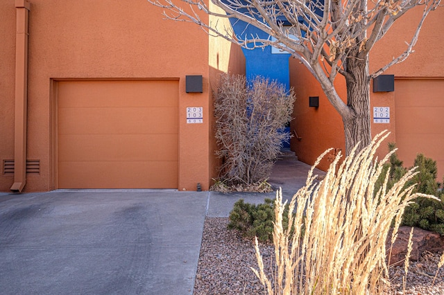 exterior space featuring a garage