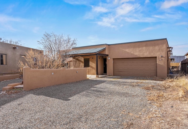 adobe home with a garage