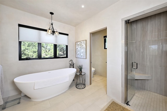 bathroom featuring tile patterned floors, toilet, plus walk in shower, and a notable chandelier