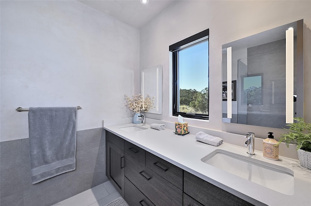 bathroom featuring tile patterned floors and vanity