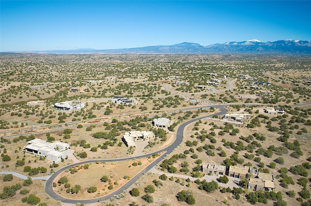 drone / aerial view featuring a mountain view