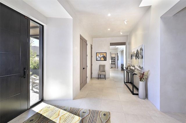foyer with light tile patterned floors