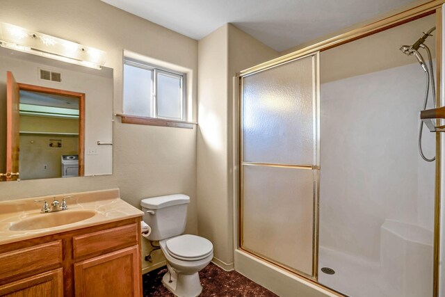 laundry area featuring carpet, a baseboard heating unit, ceiling fan, a textured ceiling, and washer / clothes dryer