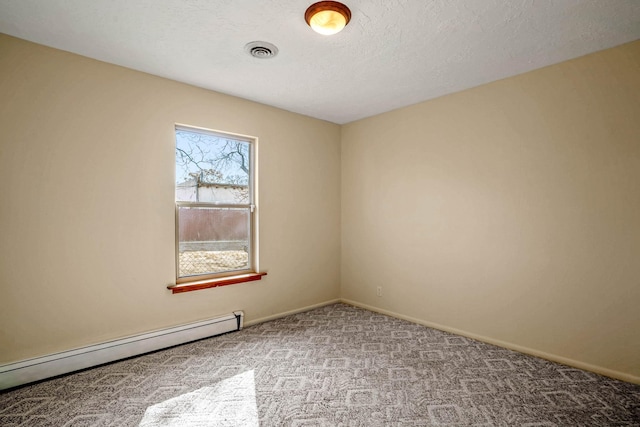 unfurnished room with light colored carpet, a textured ceiling, and a baseboard heating unit