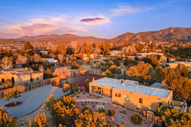 aerial view at dusk with a mountain view