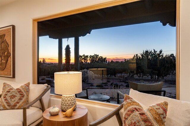 balcony at dusk with outdoor lounge area