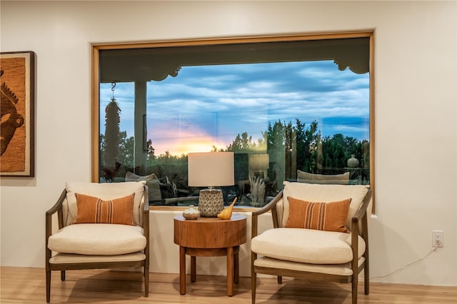 sitting room featuring hardwood / wood-style flooring