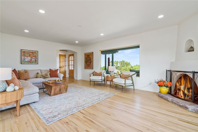 living room with light hardwood / wood-style flooring