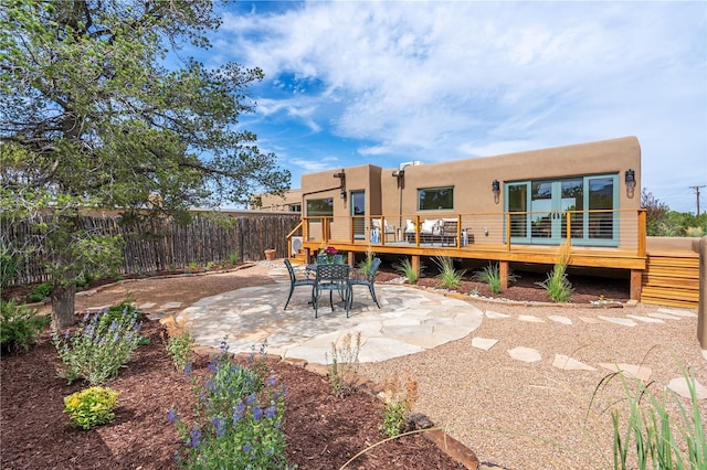 view of patio / terrace featuring a wooden deck