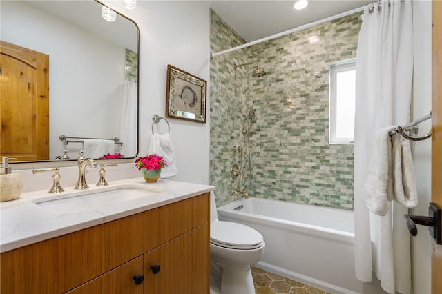 full bathroom featuring shower / bath combination with curtain, vanity, toilet, and tile patterned floors