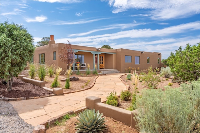 adobe home with a porch