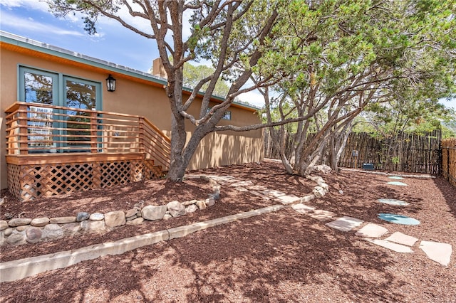 view of yard featuring a deck