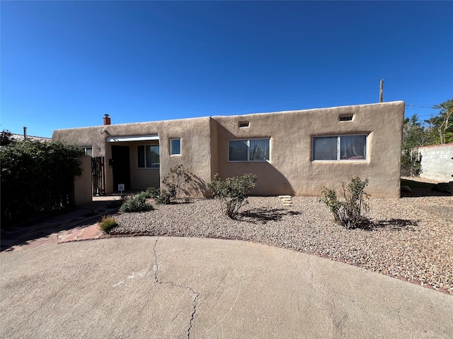 view of pueblo revival-style home