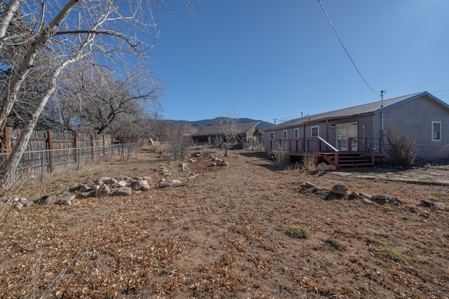 view of yard featuring a deck