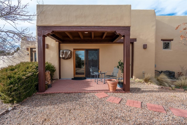 rear view of house featuring a patio area