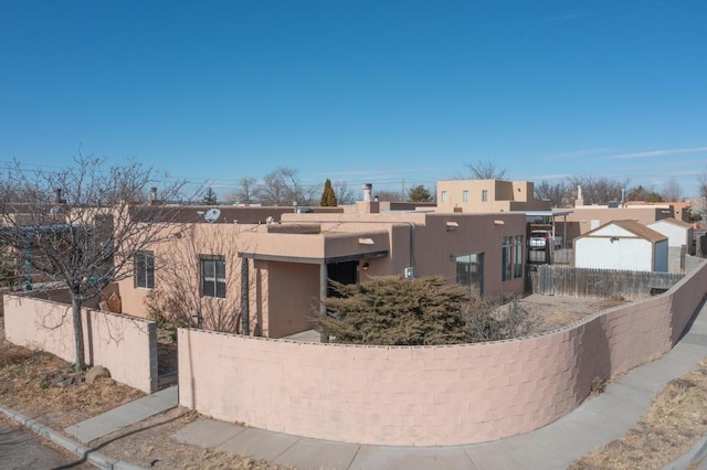 view of adobe home