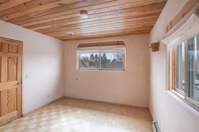 empty room featuring wooden ceiling and light parquet floors