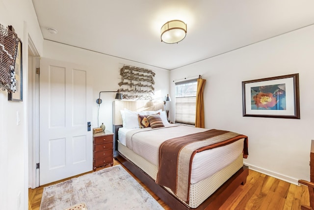 bedroom featuring hardwood / wood-style floors